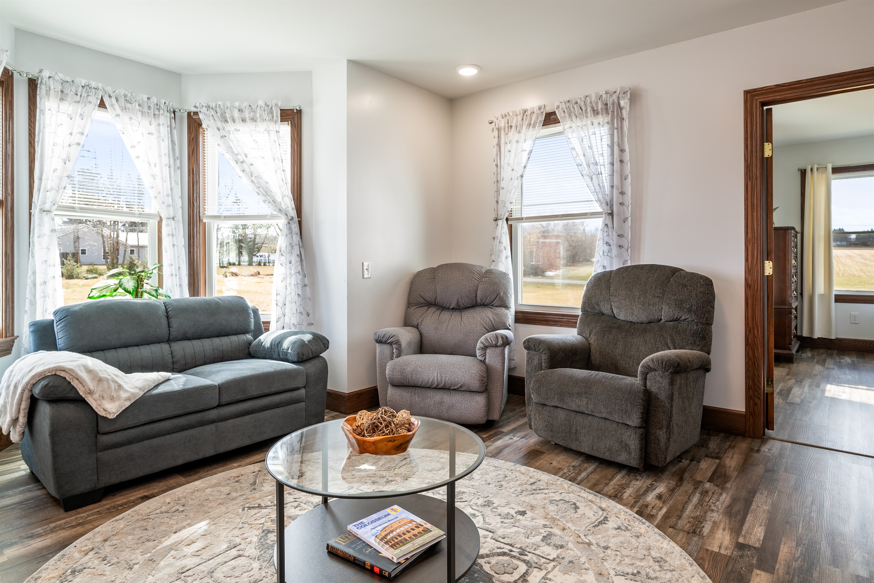 Cozy living room with plush seating — unwind after a day exploring the Finger Lakes