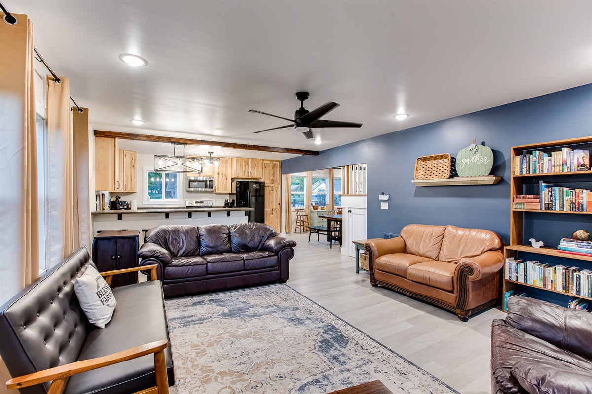The open floor plan allows the whole family to be together, while having plenty of room to spread out!  The main floor includes 2 bedrooms, dining room, kitchen, living room and sunroom!