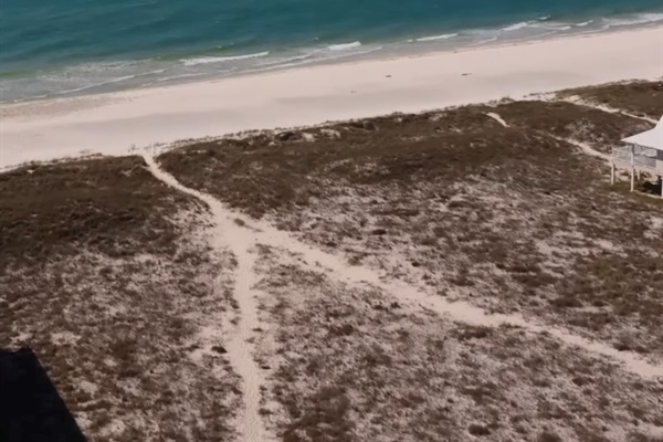 Private Gulf beach trail right across the street