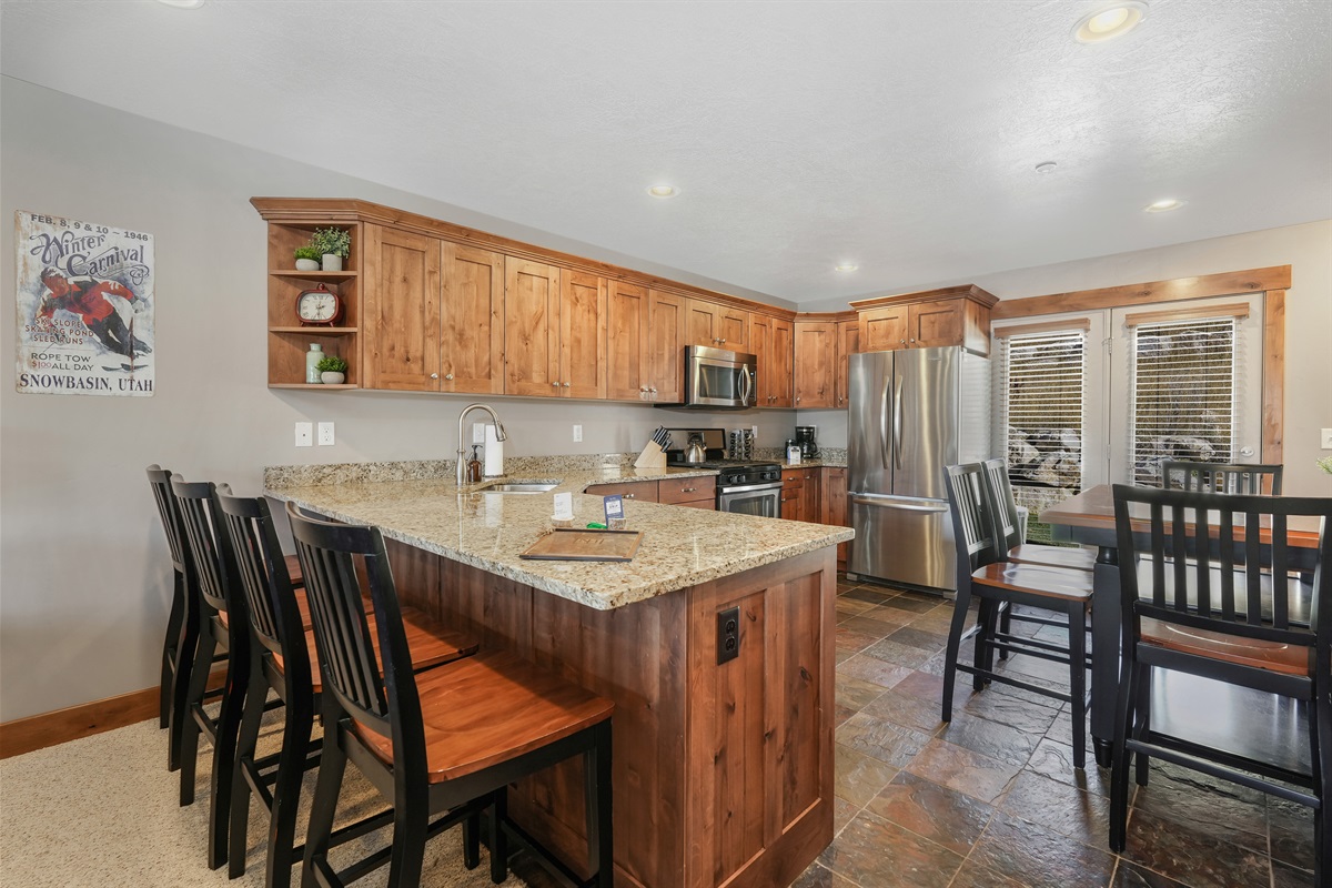 A fully equipped kitchen with plenty of space to cook, gather, and enjoy meals together.