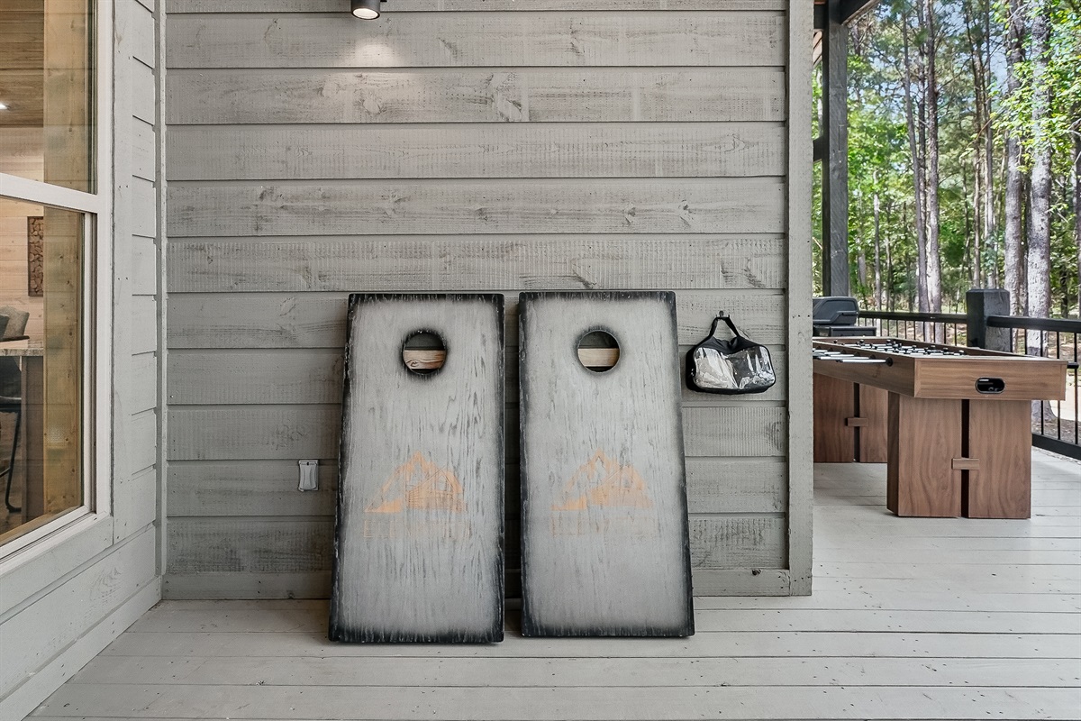 A cabin trip is never complete without some friendly corn hole competition.