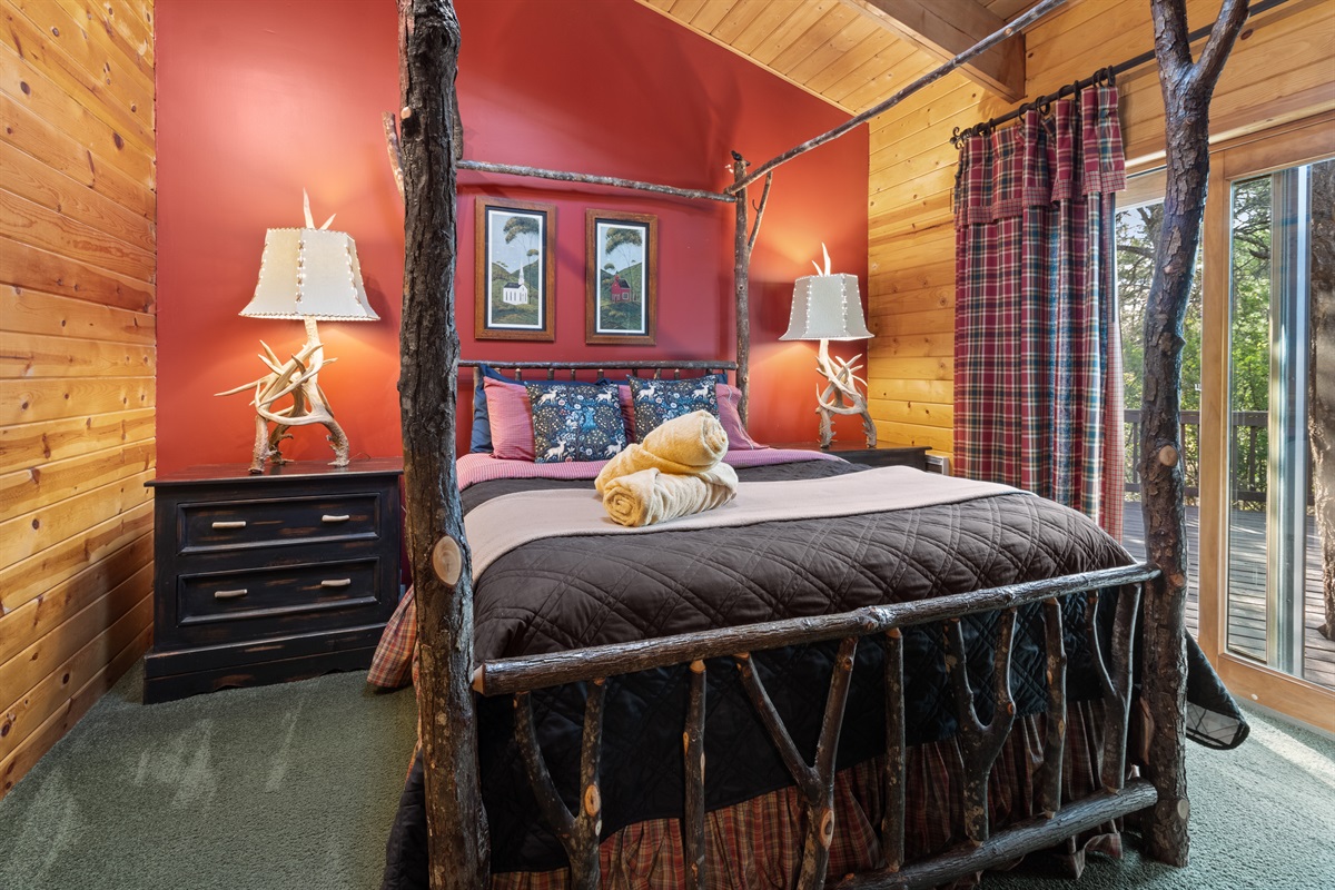 2nd master bedroom with queen poster bed