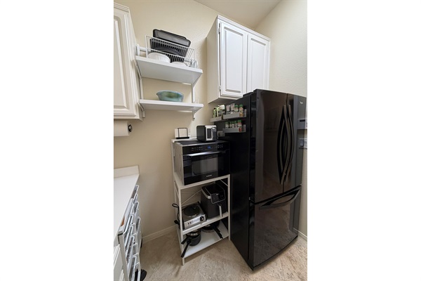 Cooking essentials with spices, oils, and prep tools