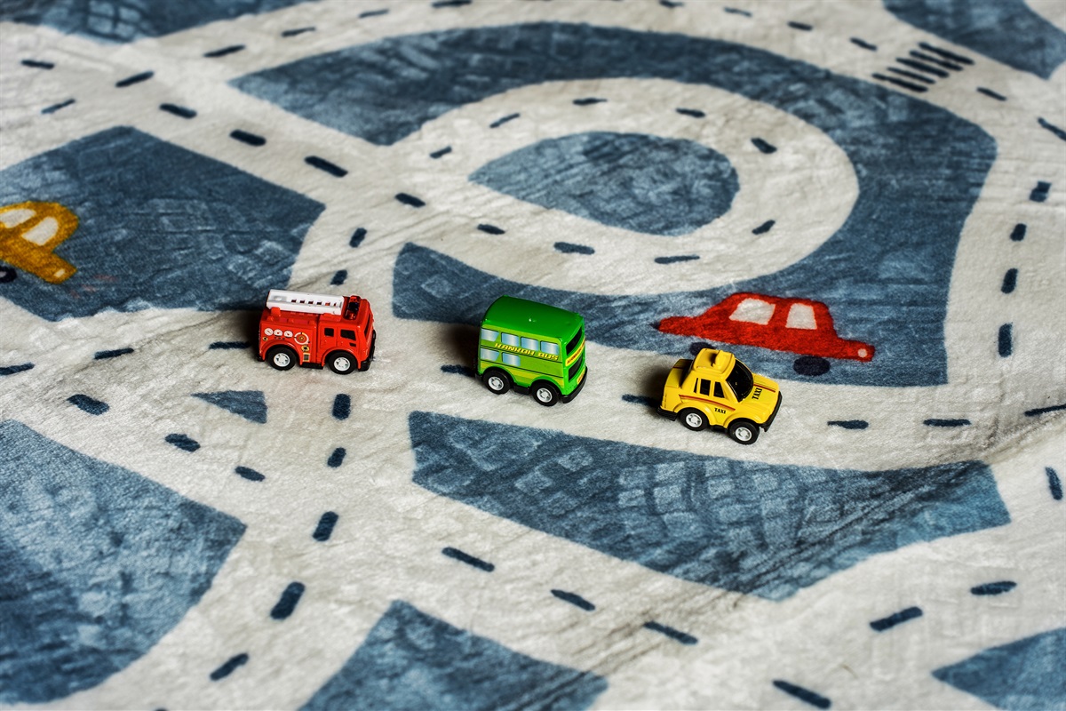 Family-friendly kids room with bunk beds, toy table, and cheerful vibes.