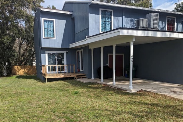 Carport with driveway.  Space for about 3 cars.