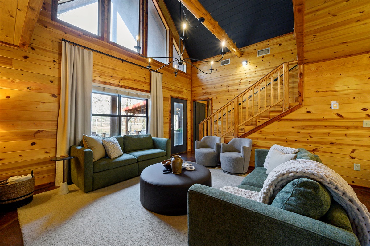 Open Concept Living Area:
Light, texture, and natural grain set the stage. Gather here for laughs, lounges, and next-level relaxation. 🛋️