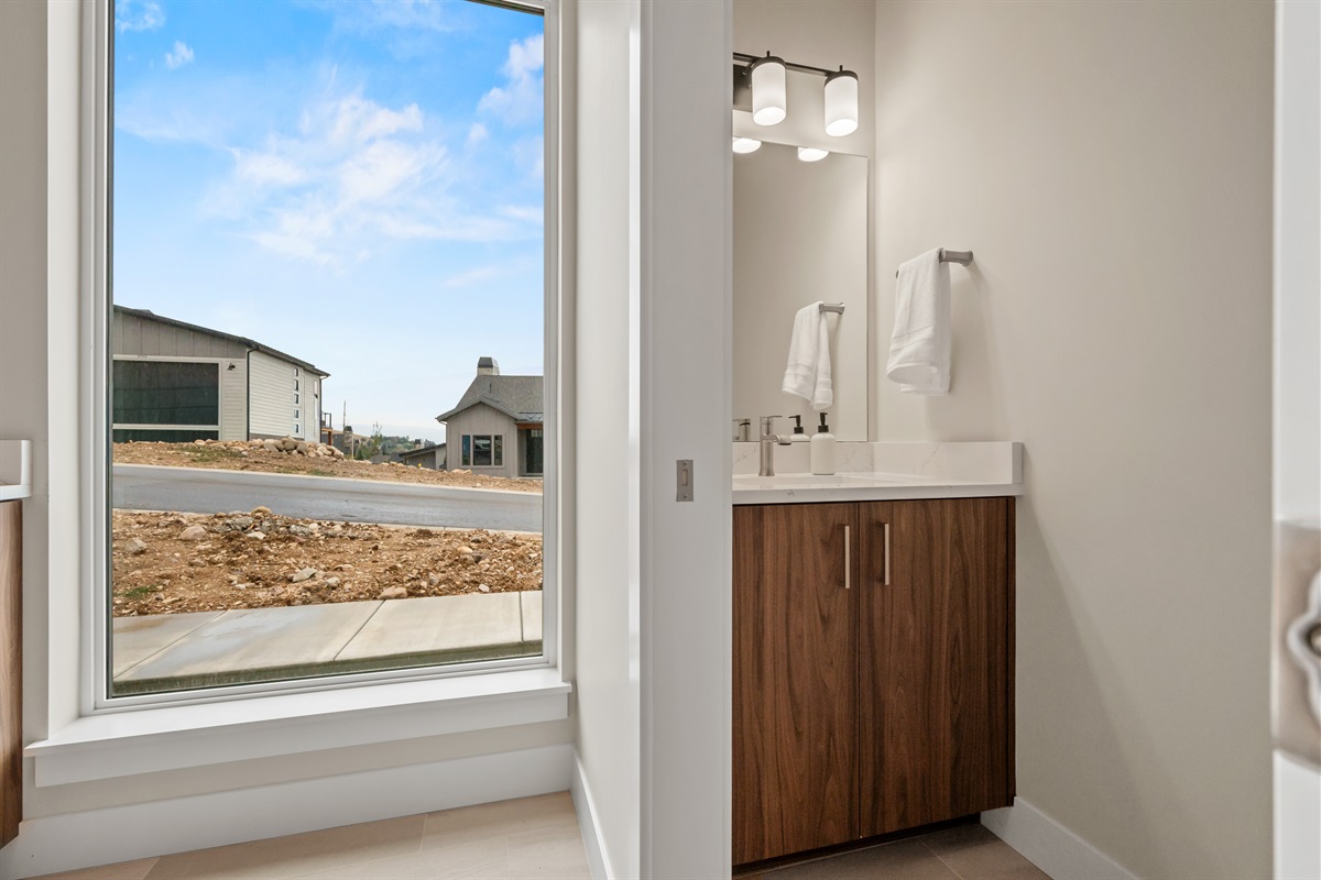 Half Bath within the laundry room.