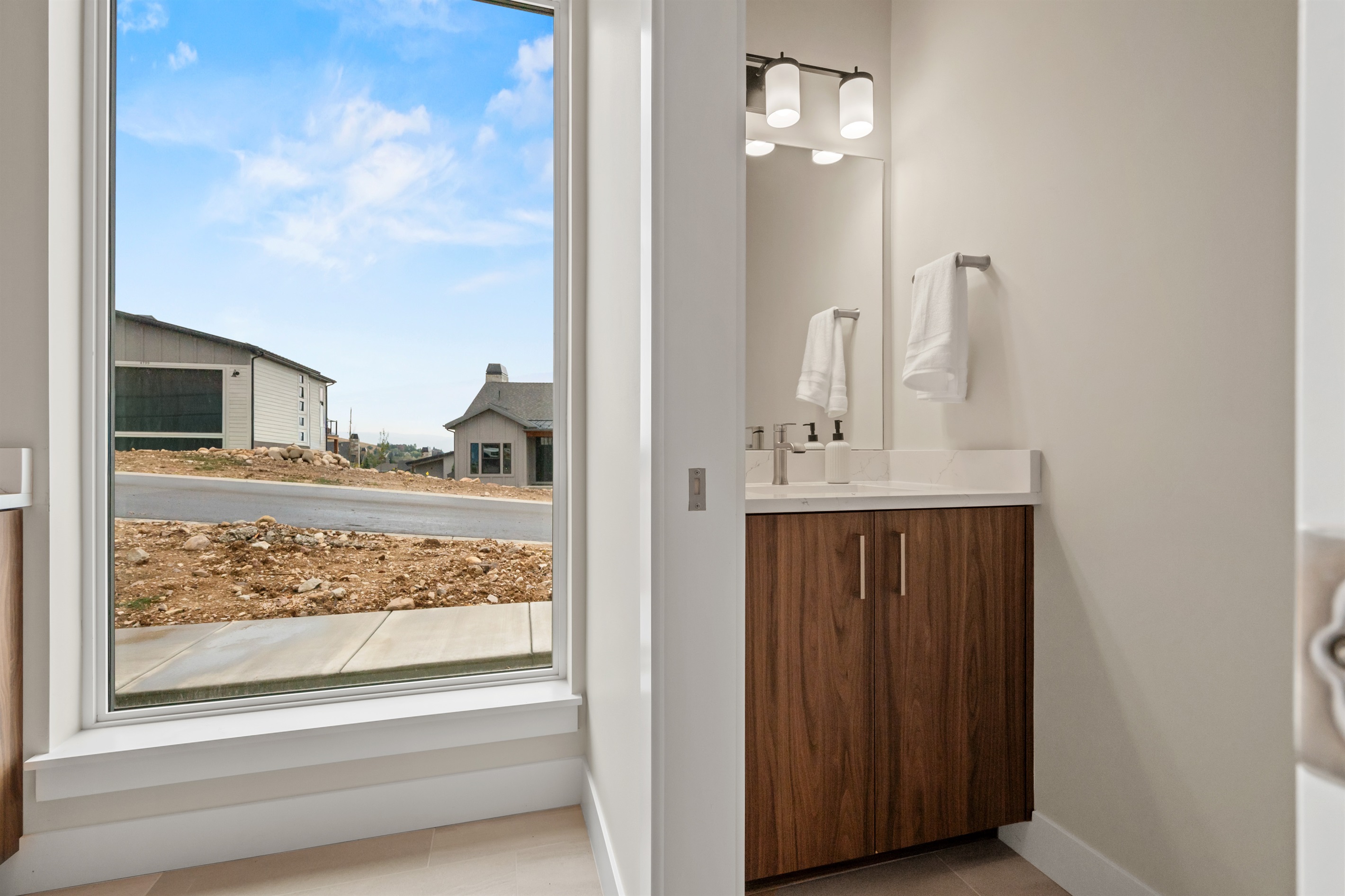 Half Bath within the laundry room.