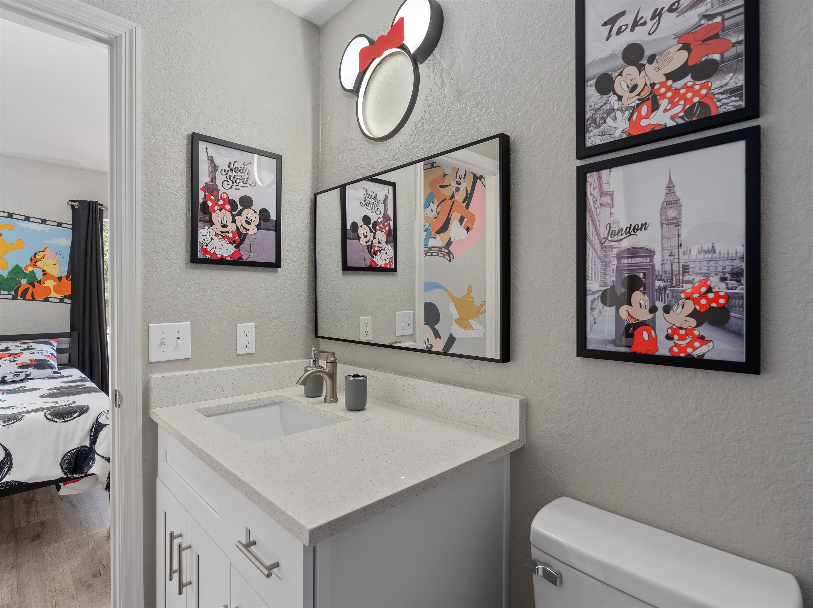 Private ensuite bathroom attached to the kids’ Disney-themed bedroom