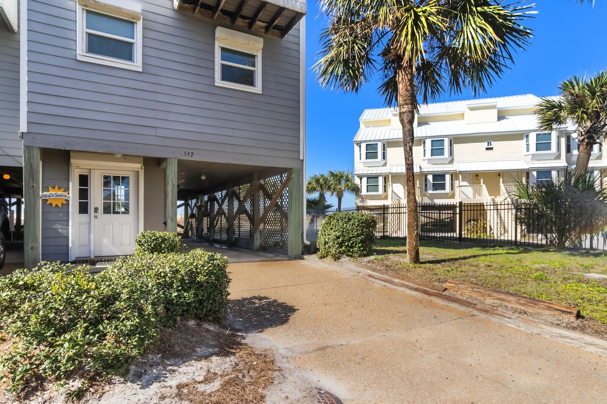 Pull into your private driveway, covered carport right ahead &mdash; the whole arrival is handled before you even open a door.