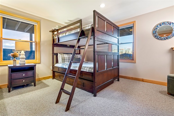 With a cozy bunk bed and a separate bed, there's plenty of space for everyone.