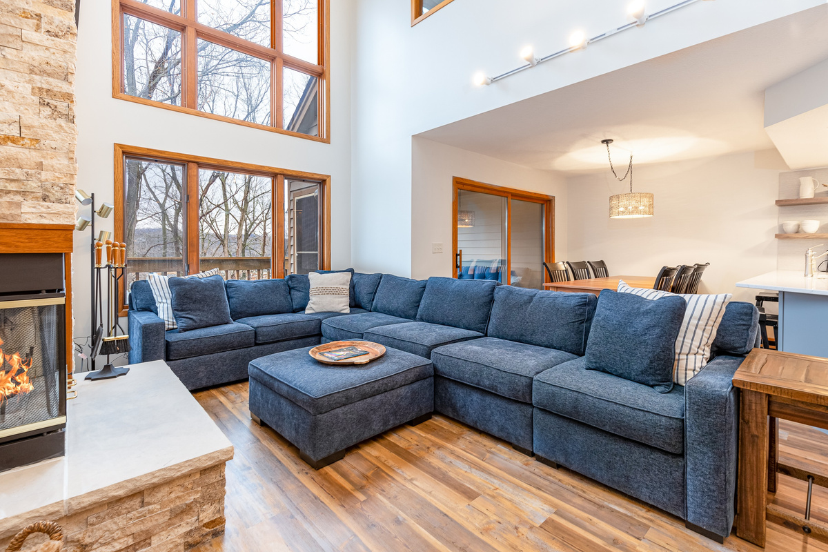 Relax in comfort with a cozy fire and a good movie