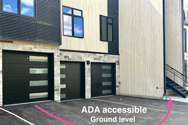 Single vehicle heated garage, plus an outdoor reserved spot (2 total).  Also included is your own level 2 EV charger (J1772 & Tesla compatible w/ provided adapter).  Steps away from ground level entry hallway.  ADA accessible.