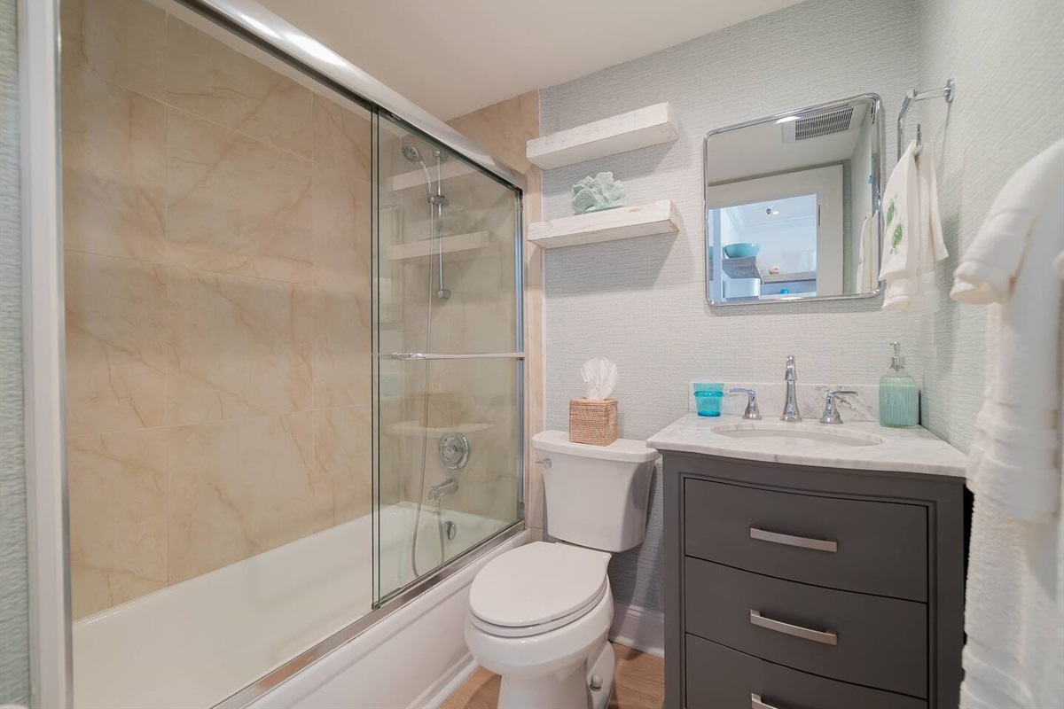 Shower tub soon to be renovated but fine for now. Soak up some bubbles and let your cares drift away.