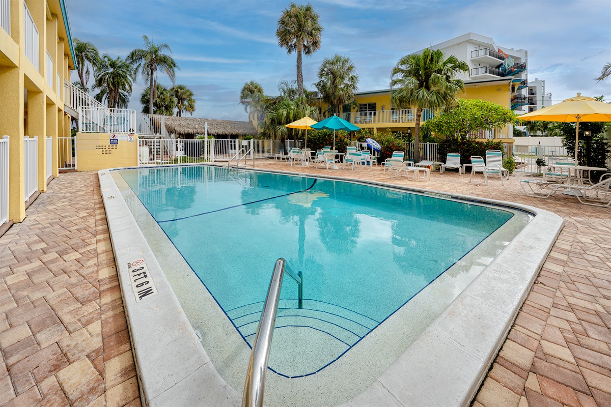 Large pool and multiple patio areas