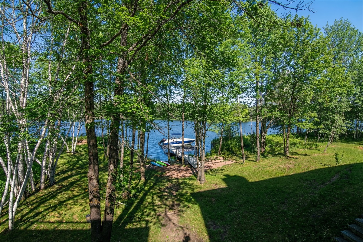 Bring your boat to this lakefront paradise on Pine Lake!