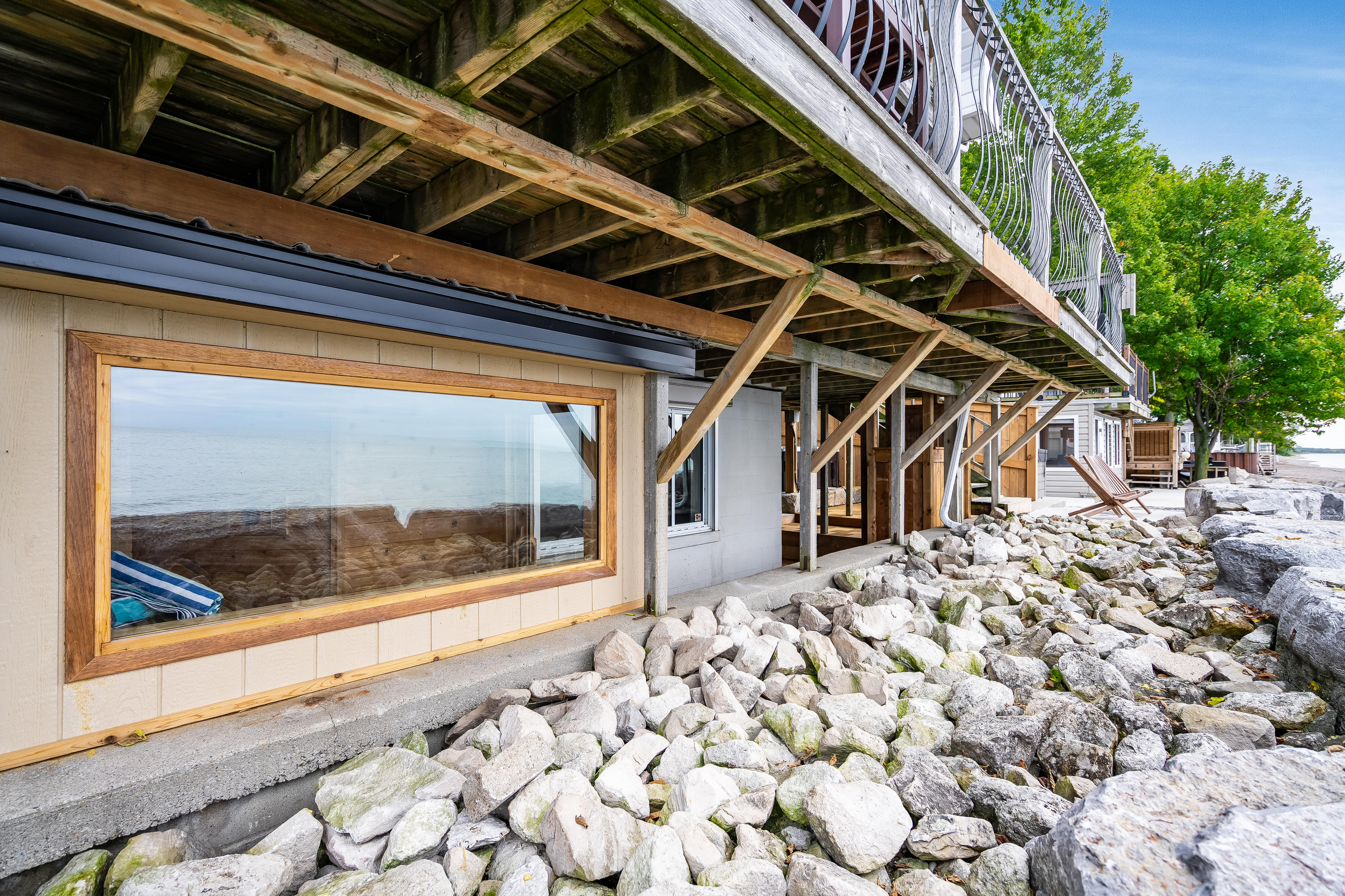 Waterfront setting with natural stone landscaping