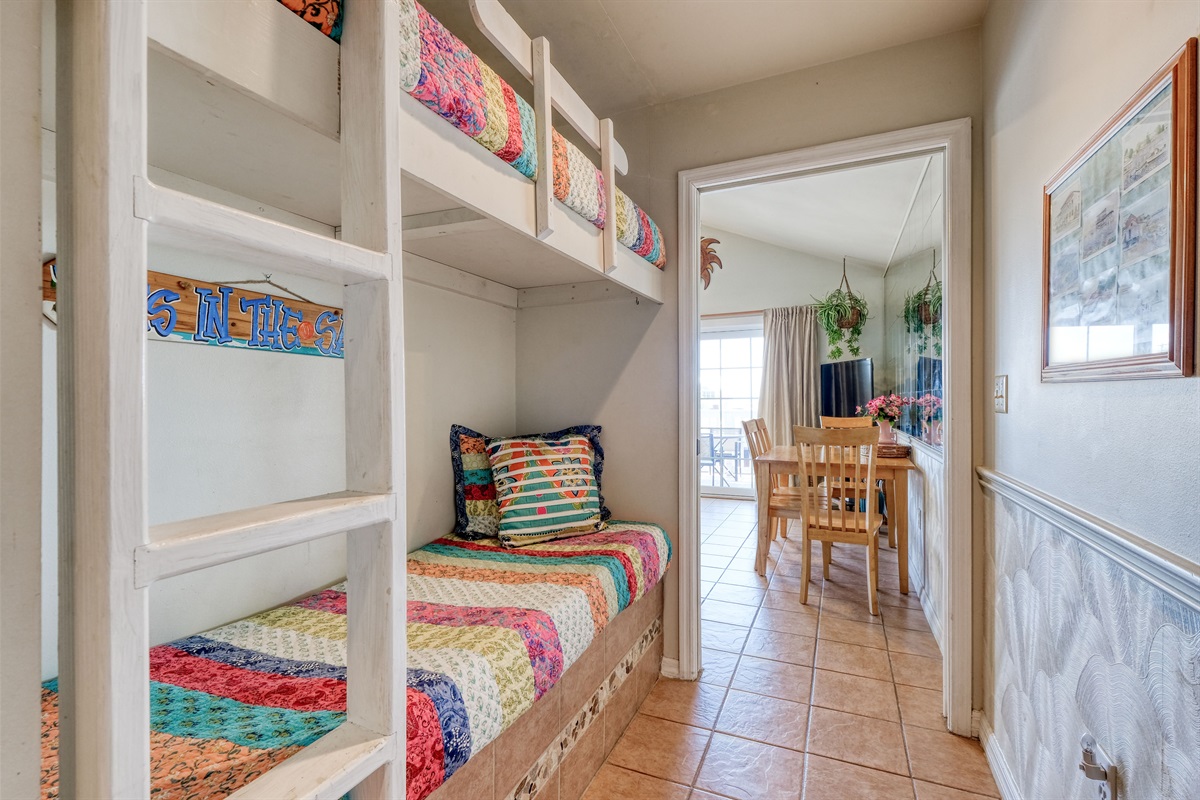 Twin bunk beds on hall