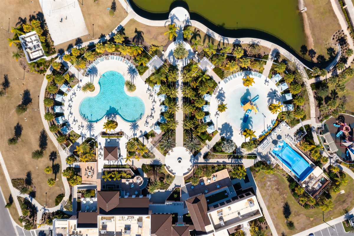 Resort Pool Paradise: Dive into fun at our stunning pool surrounded by lush palm trees!