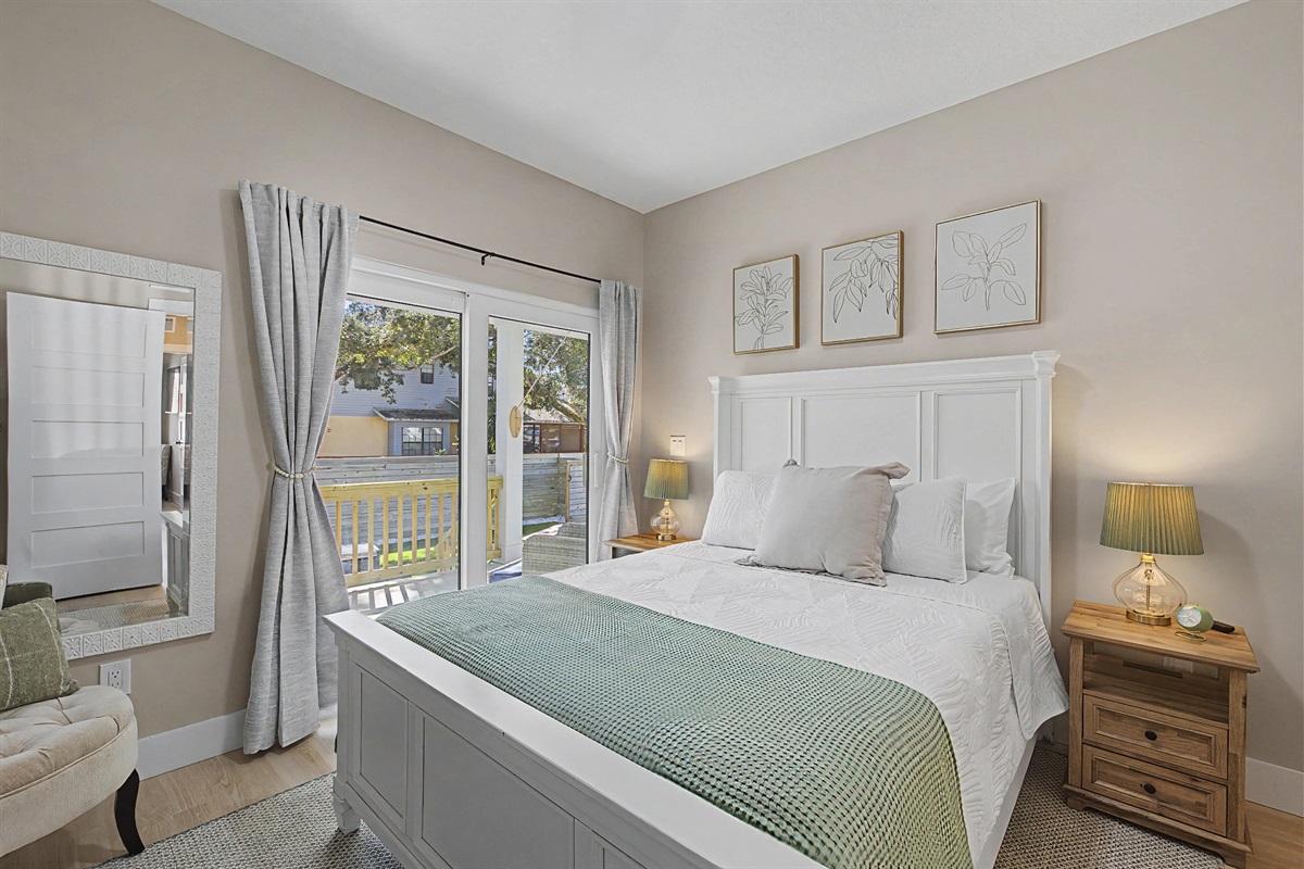 with slider to covered porch overlooking yard