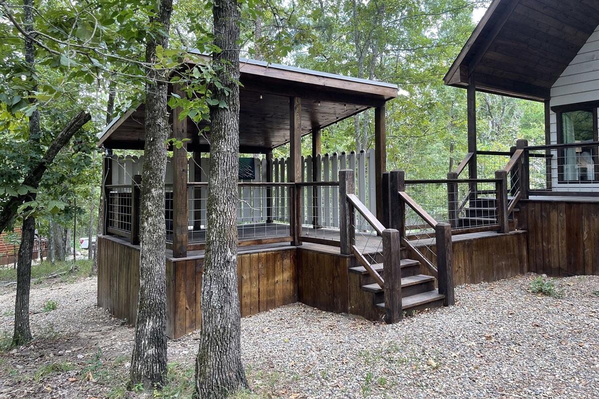 View of the separate hot tub area from the backyard.