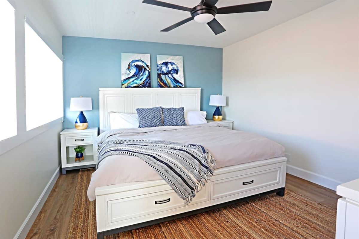 [Master Bedroom] Sleep soundly on our new premium king mattress and fine linens.