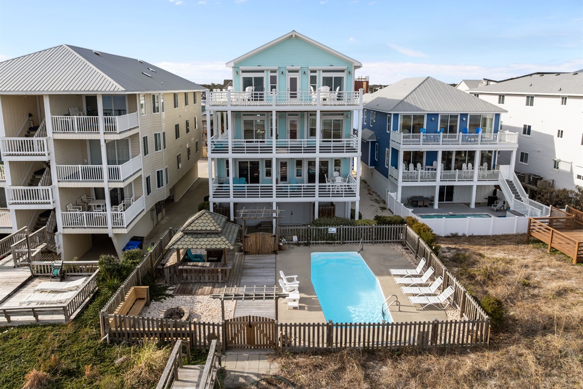 Carolina Calm: your private oceanfront vacation home with pool, elevators, and tiki bar.