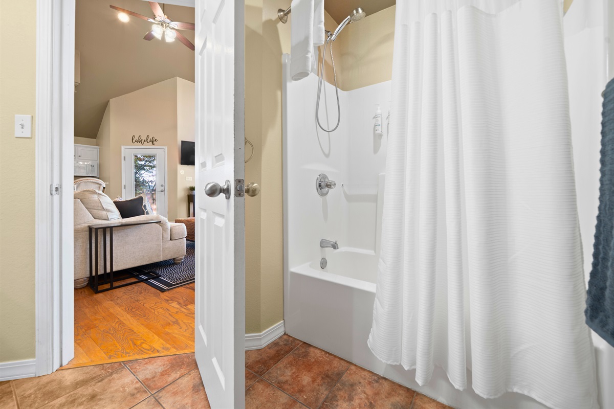 This simple and refreshing shower area is ideal for rinsing off after swimming or exploring the outdoors.