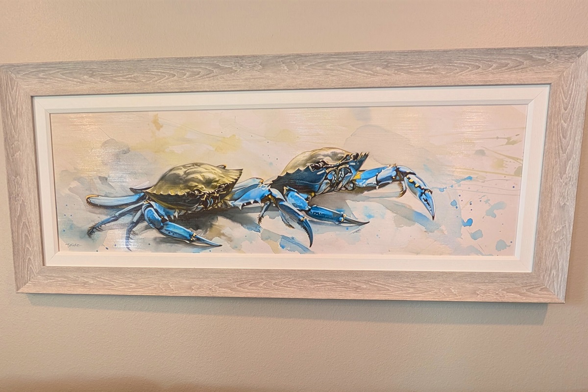 Beautiful coastal artwork throughout the home