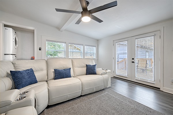 Living Room with Sectional and Large Screen TV
