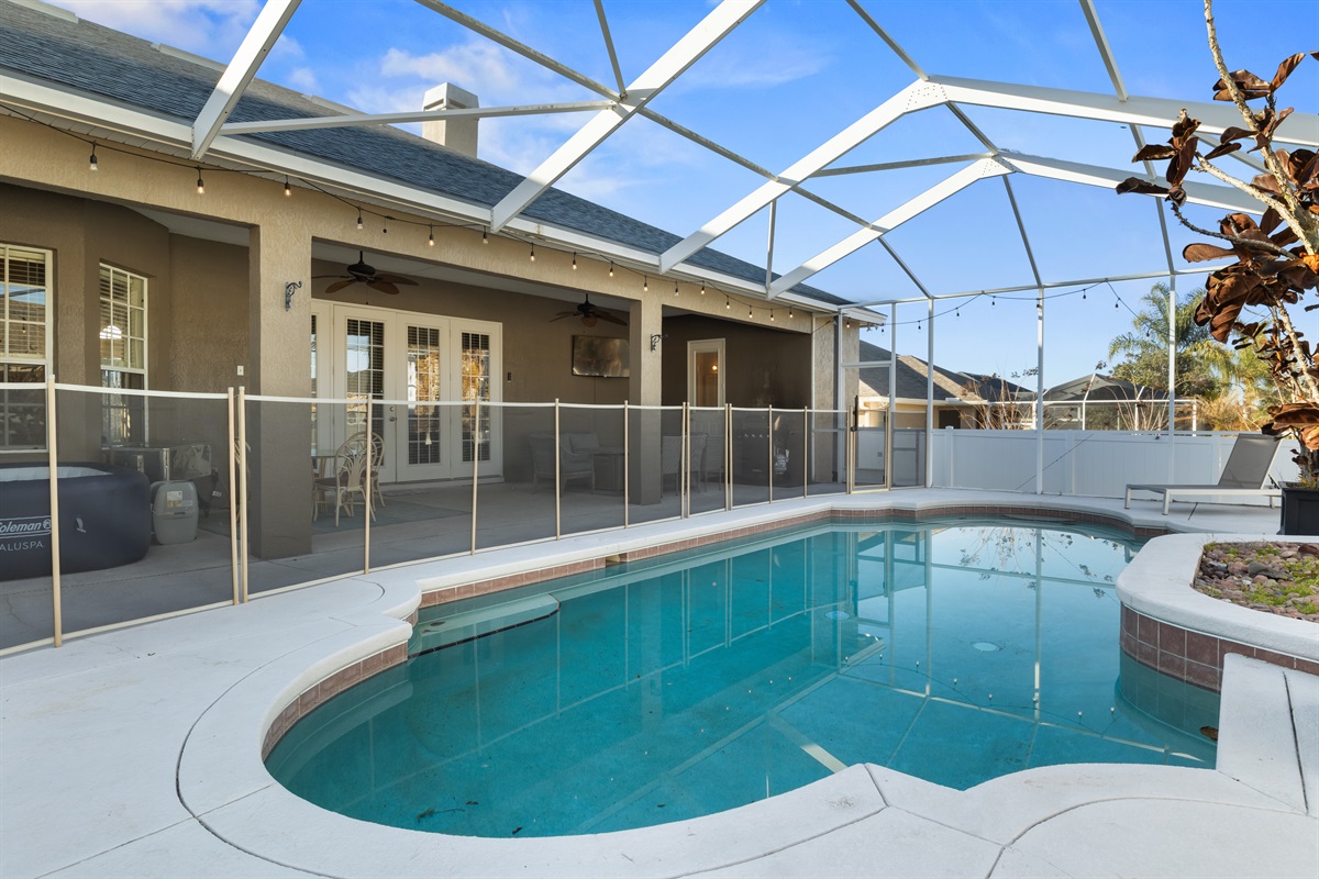 Pool child safety fence with entry gate.