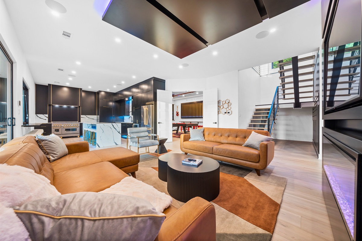 With comfy seating and a sleek design, this living room is the ideal place to unwind and entertain.