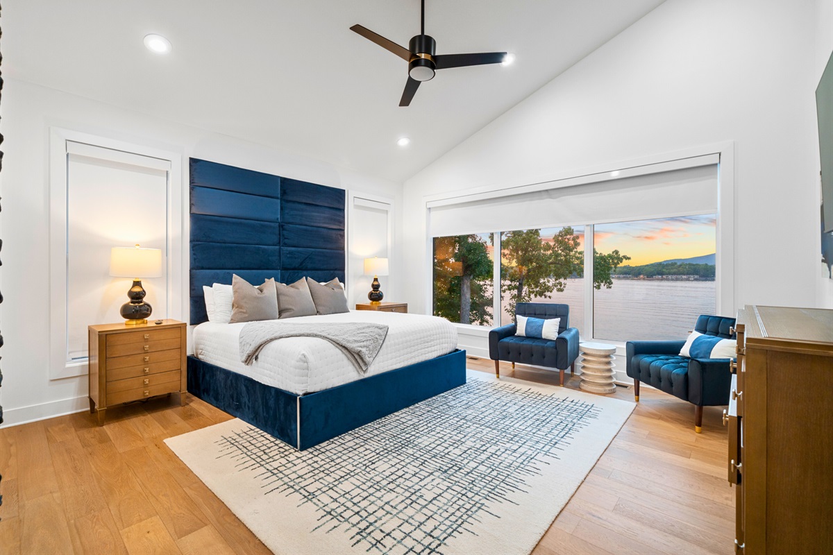 Wake up refreshed in a sunlit bedroom with modern elegance and serene views.