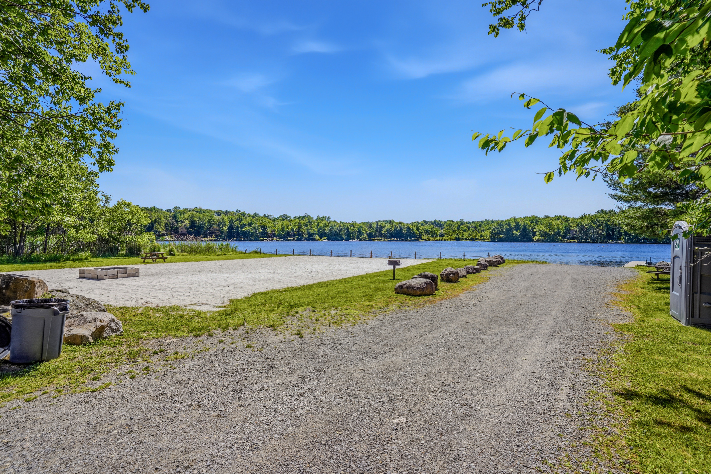 Community beach on Lake Carobeth — sandy shoreline and open water access