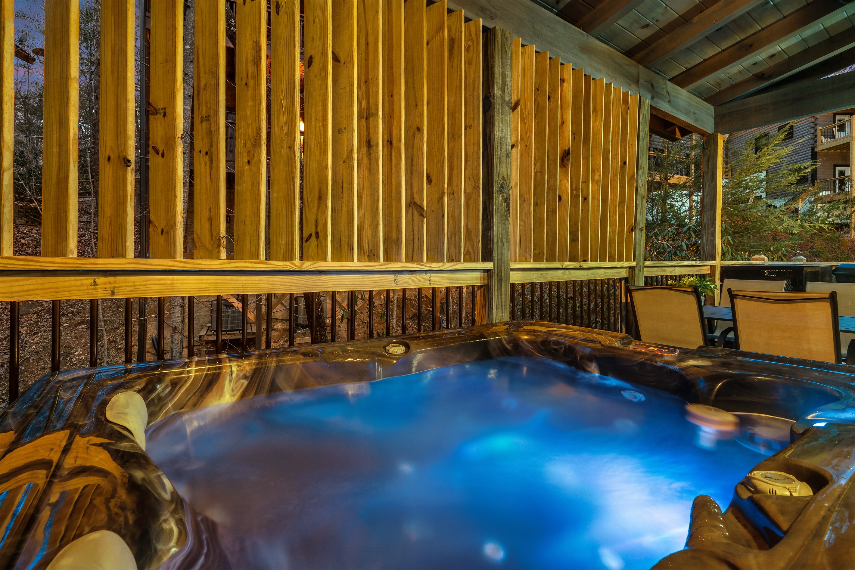 Hot Tub Oasis: Relax under the stars in your private retreat with vibrant twilight views!