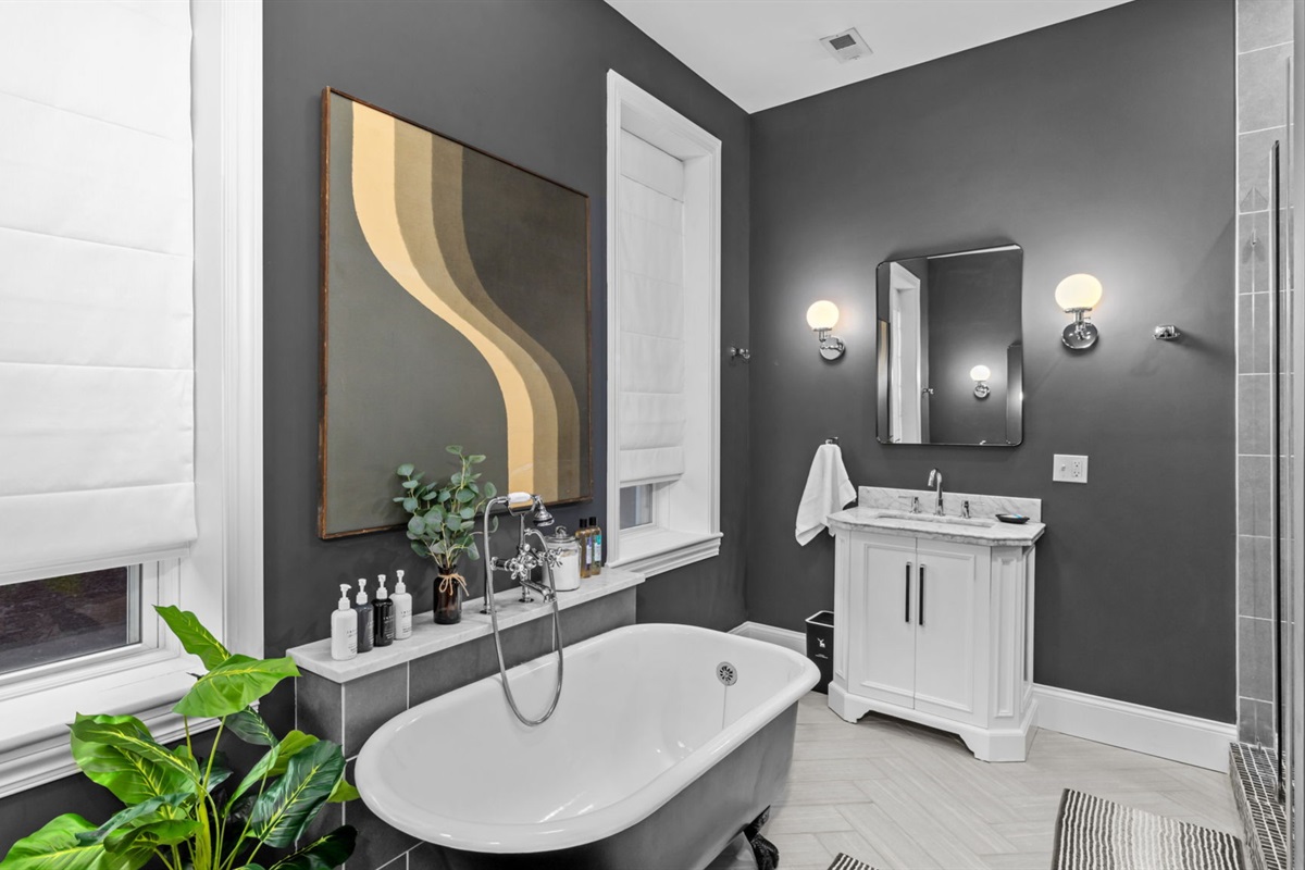 The master bath is equipped with two separate vanities so no need to fight over the space.