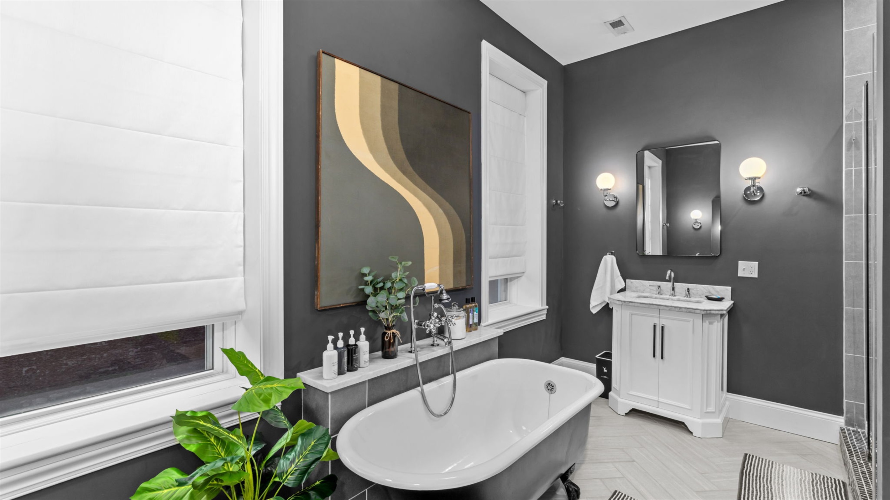 The master bath is equipped with two separate vanities so no need to fight over the space.