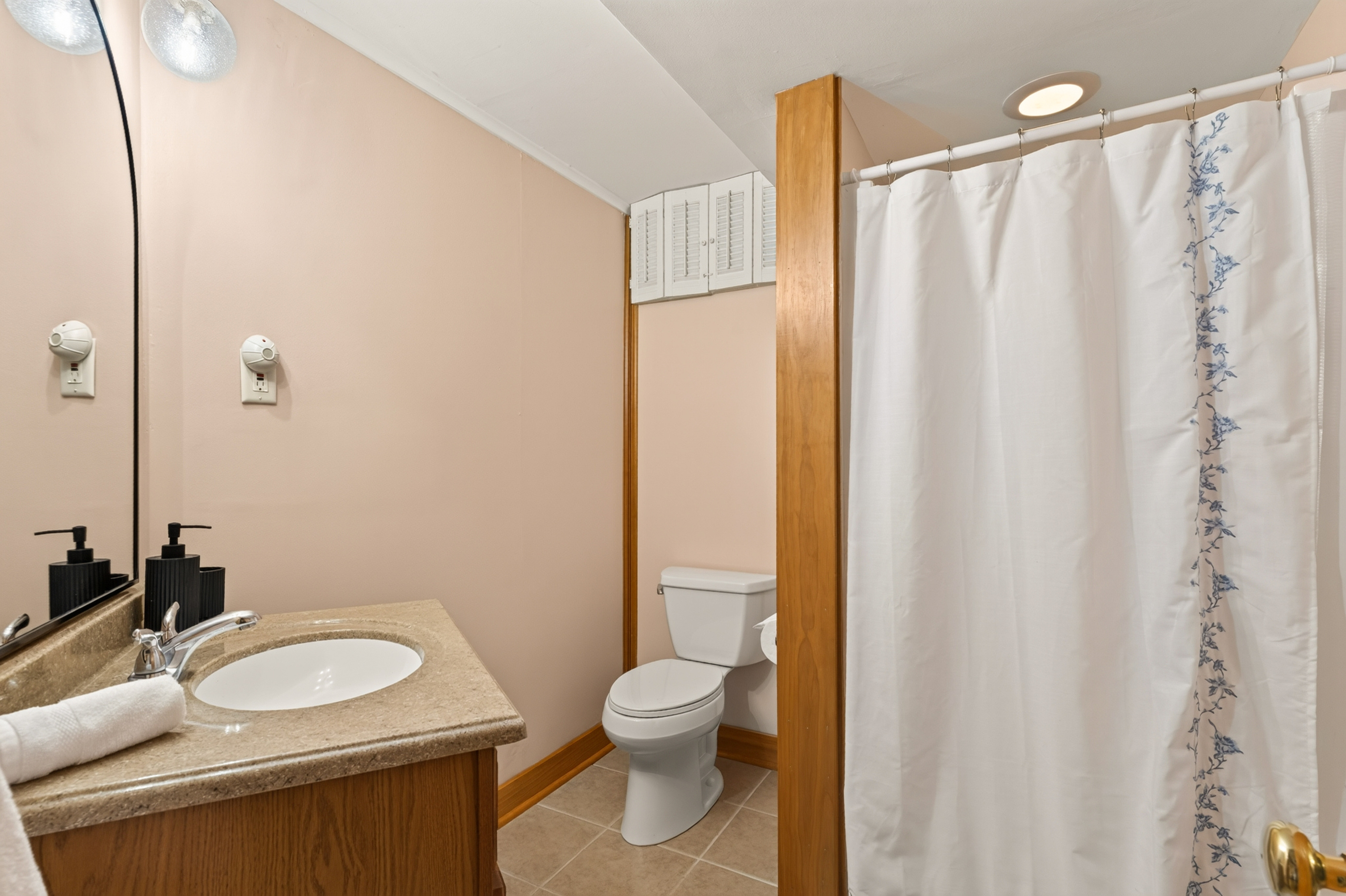 Full bathroom with shower and toilet