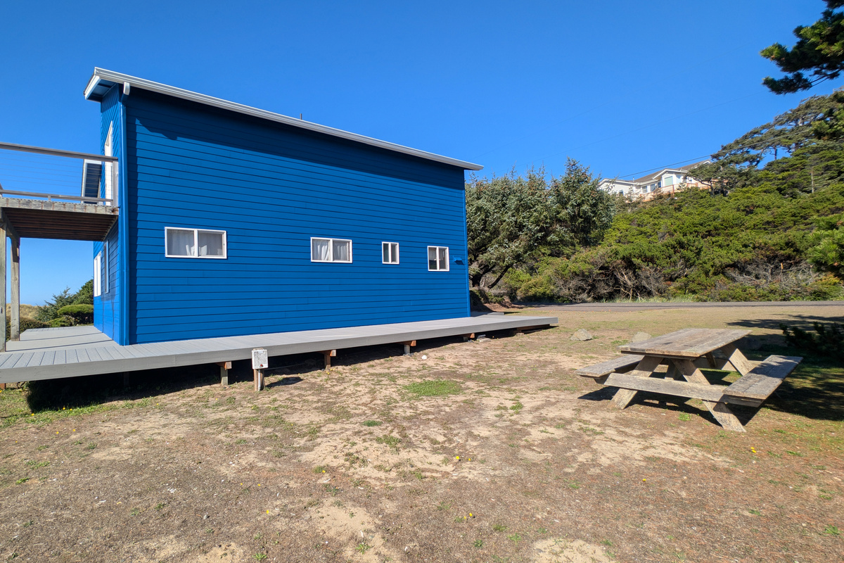 picnic table and south side deck and yard