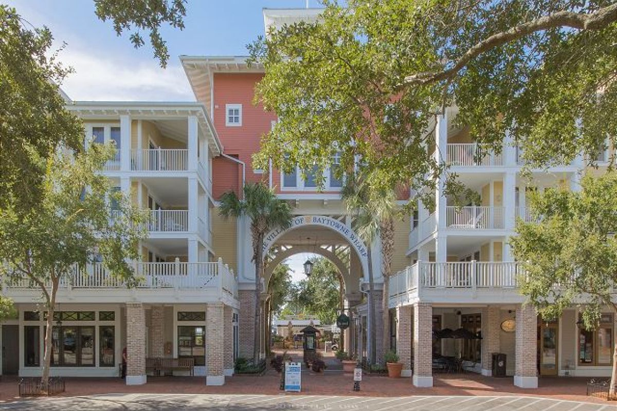 The Village of Baytowne Wharf entrance, with shops and restaurants steps from the front door