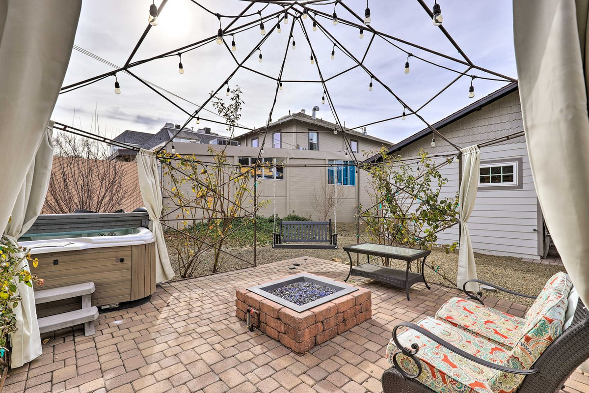 Swap stories around the fire pit as the string lights flicker overhead.