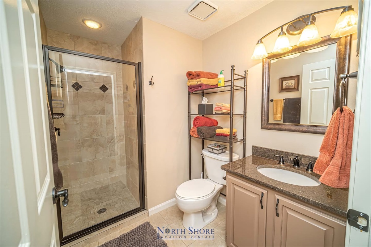Guest Bath in Hallway with Walk-in Shower