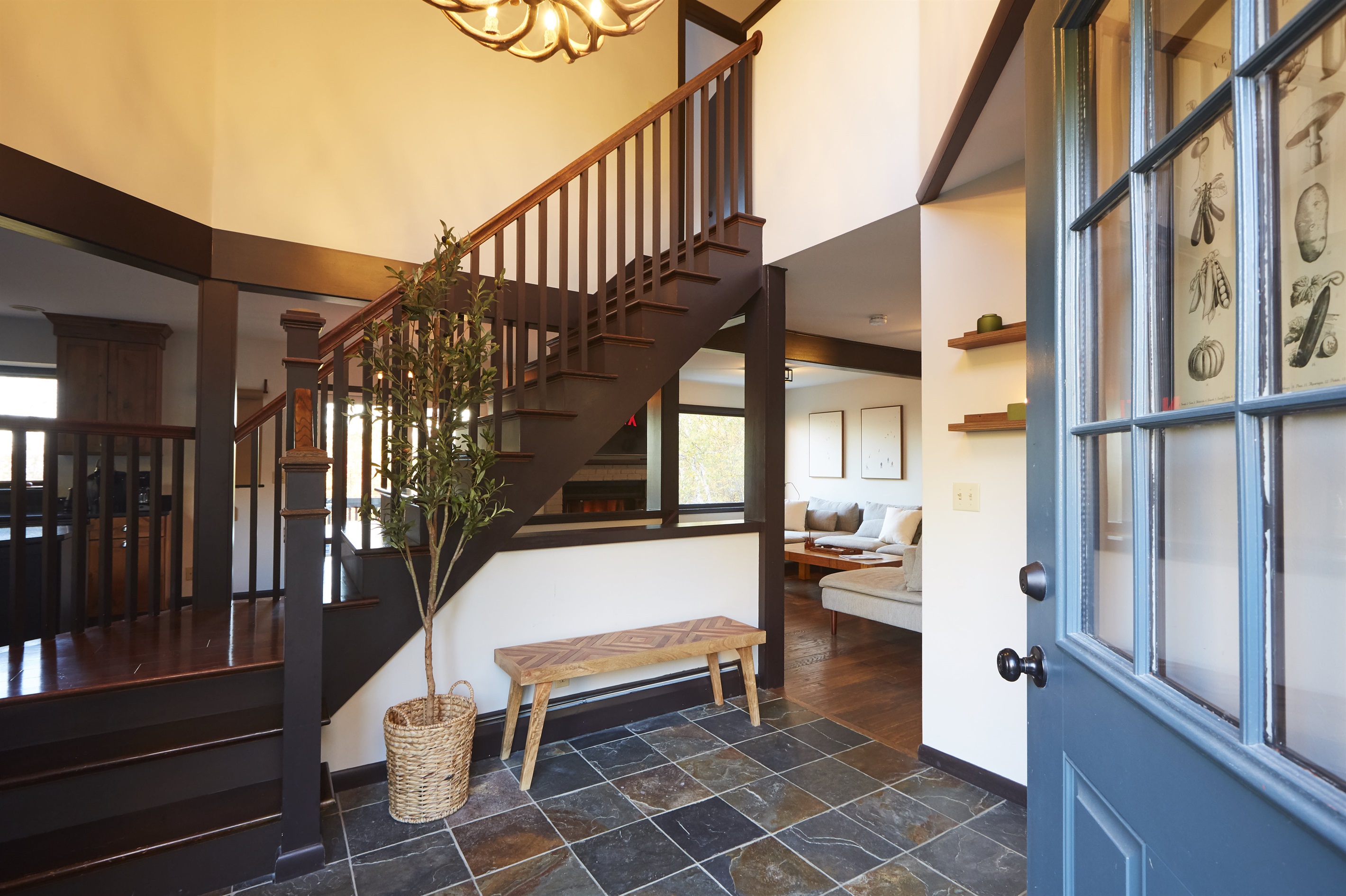 Step into the inviting entryway, where natural light and rustic touches set the tone for your stay.
