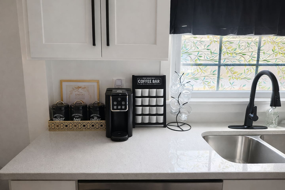 Coffee station always fully stocked with K cup pods, different types of sugar, creamer & tea pods.