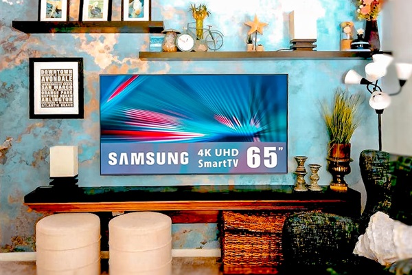 This new 65” TV takes center stage as you enter the living room area.  