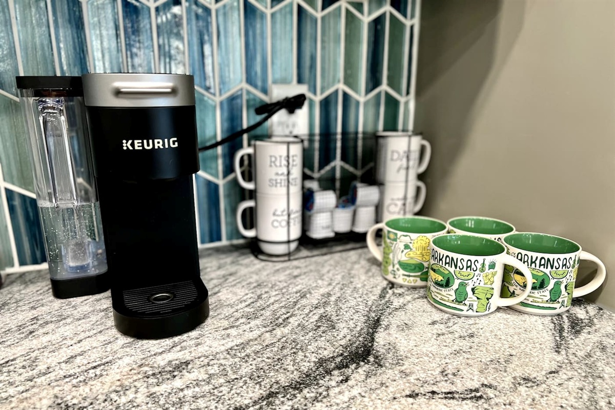 Coffee Nook: Sip your brew in style with charming mugs and a modern coffee maker!