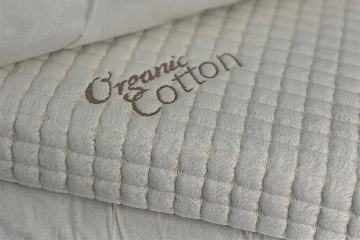 Organic cotton mattress topper for an amazing night of rest.