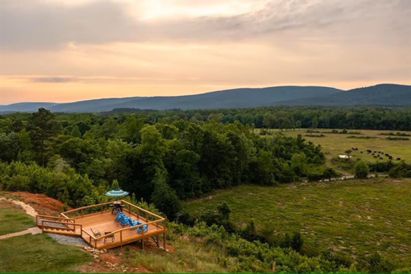 Enjoy sweeping panoramic views from the deck—stretching from the peaceful valley and river below to the majestic mountains on the horizon.