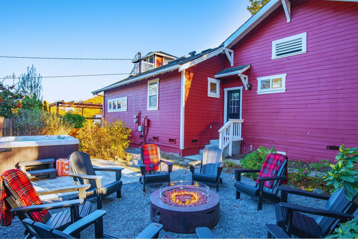 Relaxation central: our fire pit and hot tub duo!