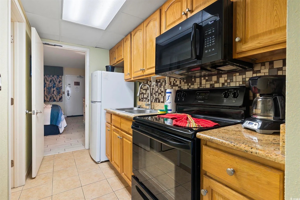 Bright and functional kitchen perfect for cooking after a day at the beach